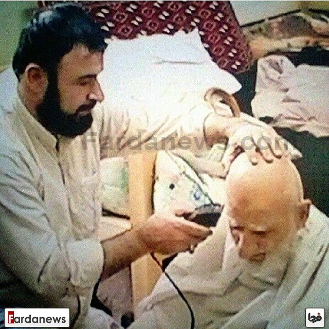 اصلاح سر آیت‌الله بهجت(ره) توسط فرزندش+عکس