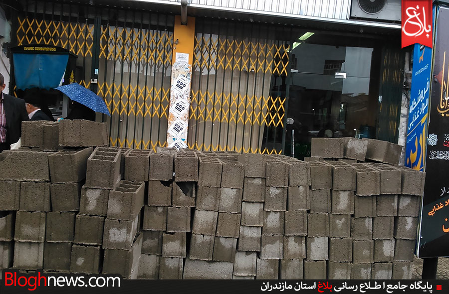 دیوارکشی شهرداری مقابل یک بانک بدهکار+تصاویر دیوارکشی شهرداری مقابل یک بانک بدهکار+تصاویر