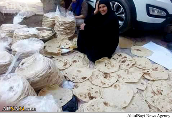 مادر مهربان نیروهای حشد شعبی عراق+عکس مادر مهربان نیروهای حشد شعبی عراق+عکس