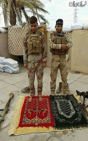 عکس/ نماز وحدت در میدان جنگ