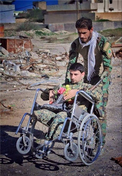بازگشت به میدان جنگ با پاهای بریده+عکس