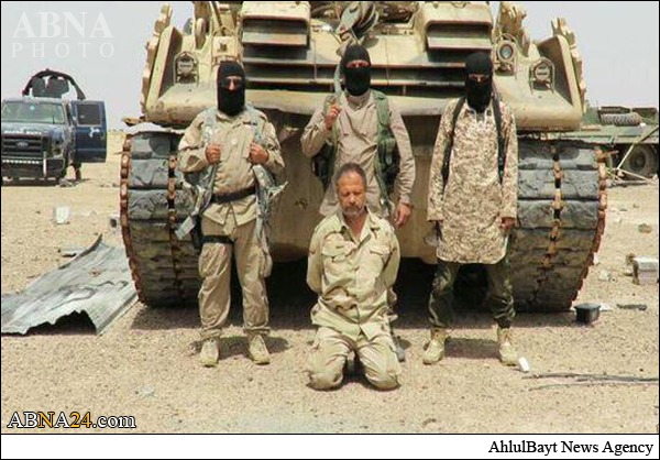 ذبح رزمنده نجفی به دست جلاد داعش + عکس ذبح رزمنده نجفی به دست جلاد داعش + عکس
