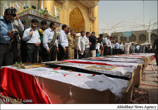 عکس/ تشییع پیکر ده ها شهید عراقی در حرم امام علی(ع) عکس/ تشییع پیکر ده ها شهید عراقی در حرم امام علی(ع)