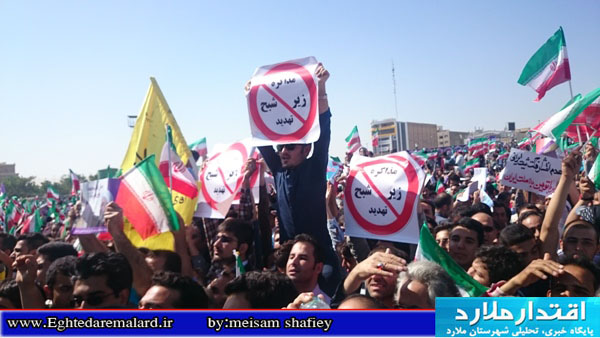 پلاکاردهای اعتراضی به مذاکرات در سفر روحانی