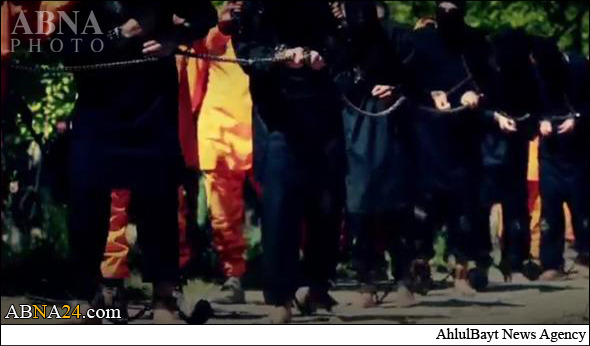 اعدام ۱۳ داعشی به دست جلادان نارنجیپوش + تصاویر اعدام ۱۳ داعشی به دست جلادان نارنجیپوش + تصاویر