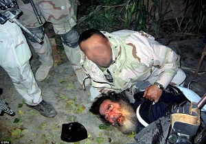 لحظه دستگیری صدام +عکس