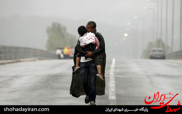 عکس/مهاجران زیر باران