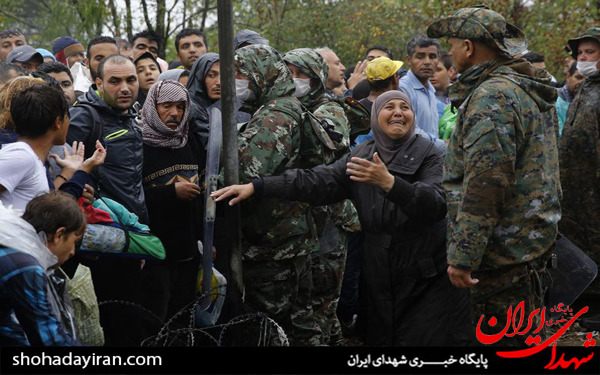 عکس/مهاجران زیر باران