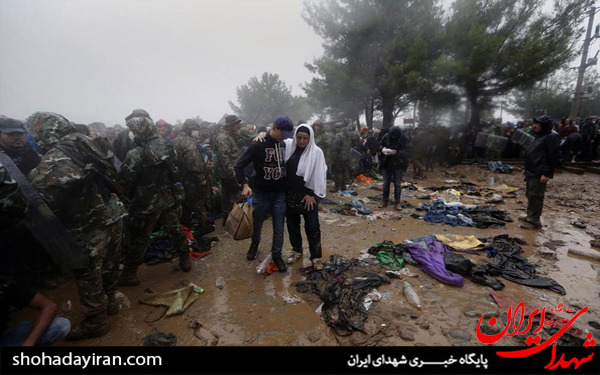 عکس/مهاجران زیر باران