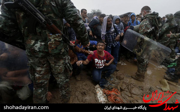 عکس/مهاجران زیر باران
