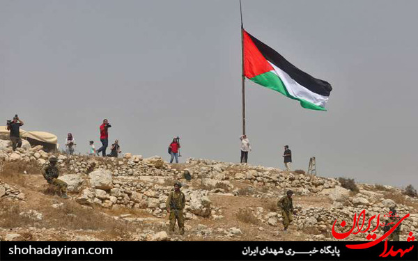 عکس/برافراشته شدن پرچم فلسطین در منطقه النبی صالح