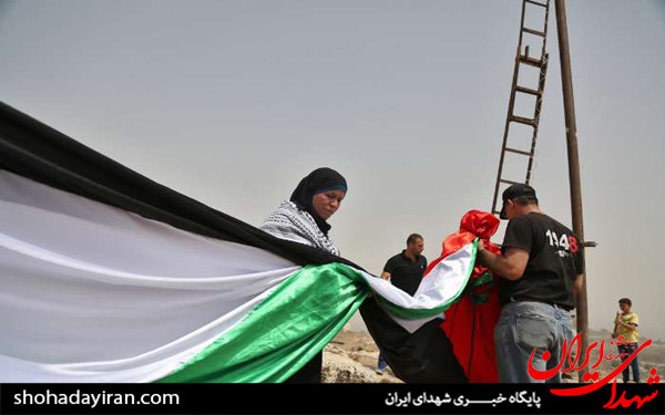 عکس/برافراشته شدن پرچم فلسطین در منطقه النبی صالح