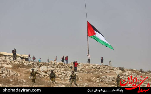 عکس/برافراشته شدن پرچم فلسطین در منطقه النبی صالح
