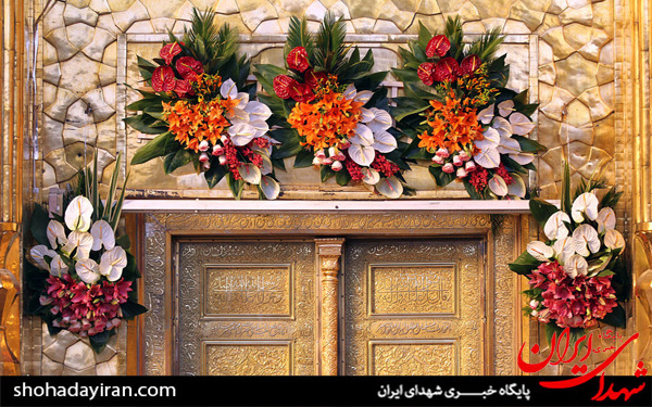 عکس/مراسم تعویض پرچم گنبد امام رضا(ع) در آستانه ولادت