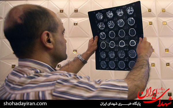 عکس/انتقال خبرنگار مجروح شده صدا و سیما در سوریه به تهران