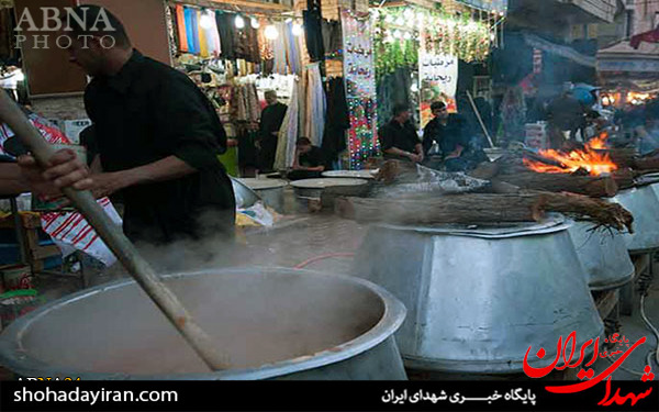 عکس/ پخش نذری به زائران کربلا