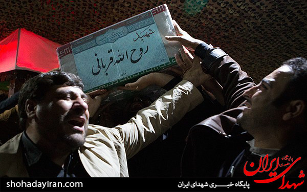 عکس/وداع با پیکر شهید روح‌الله قربانی