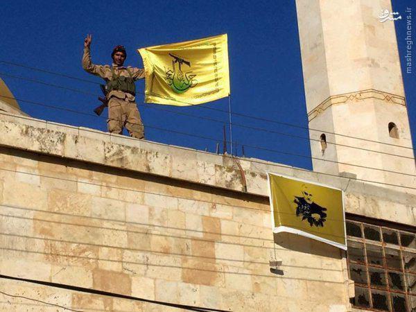 یک مدافع حرم عراقی بر بام مسجد حلب +عکس