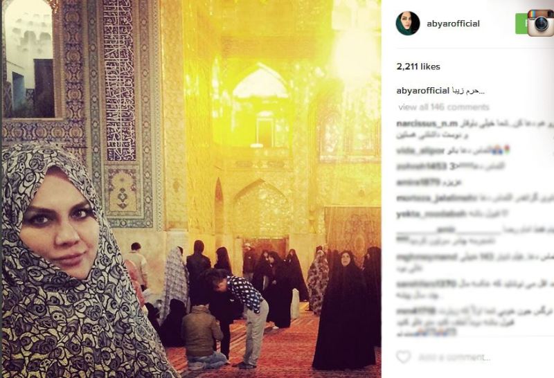 کارگردان زن با چادر در حرم امام رضا(ع) +عکس