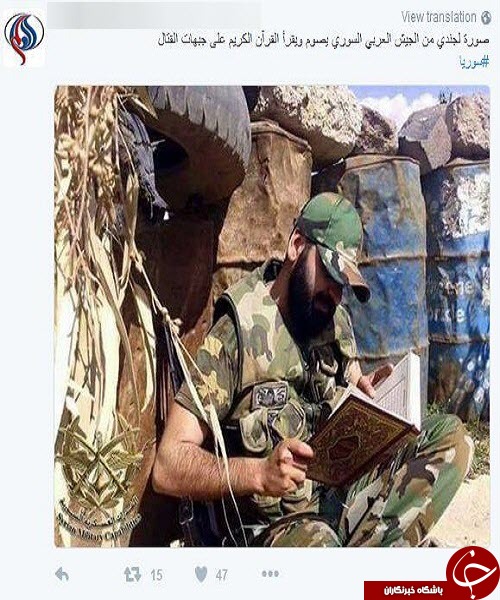 مدافع حرم با زبان روزه قرآن می‌خواند +عکس