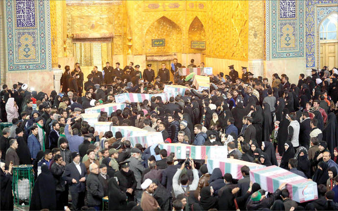 وداع با پیکر 30 شهید گمنام در حرم رضوی + عکس وداع با پیکر 30 شهید گمنام در حرم رضوی + عکس