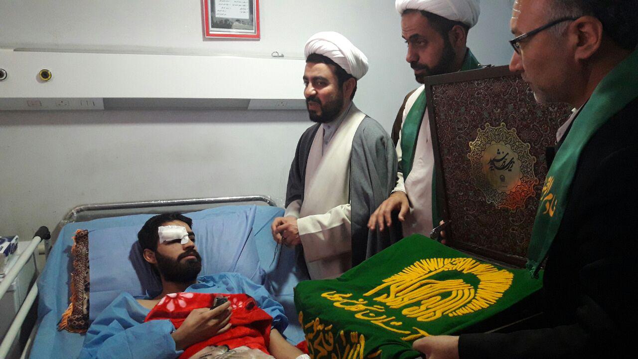 عیادت خدام امام رضا(ع) از جانبازان حشد الشعبی