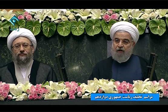 رئیس جمهور روحانی در پیشگاه قرآن کریم سوگند یاد کرد رئیس جمهور روحانی در پیشگاه قرآن کریم سوگند یاد کرد