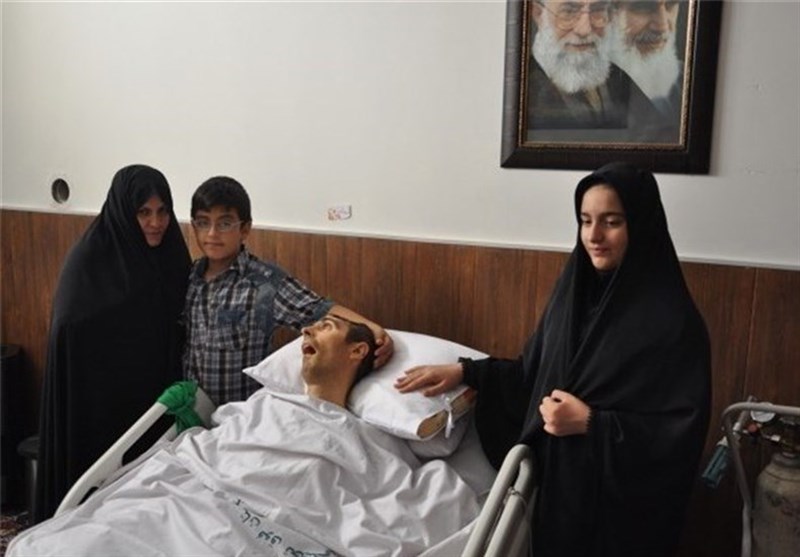 همسر جانباز ۱۰۰ درصد لرستانی تجلیل شد همسر جانباز ۱۰۰ درصد لرستانی تجلیل شد