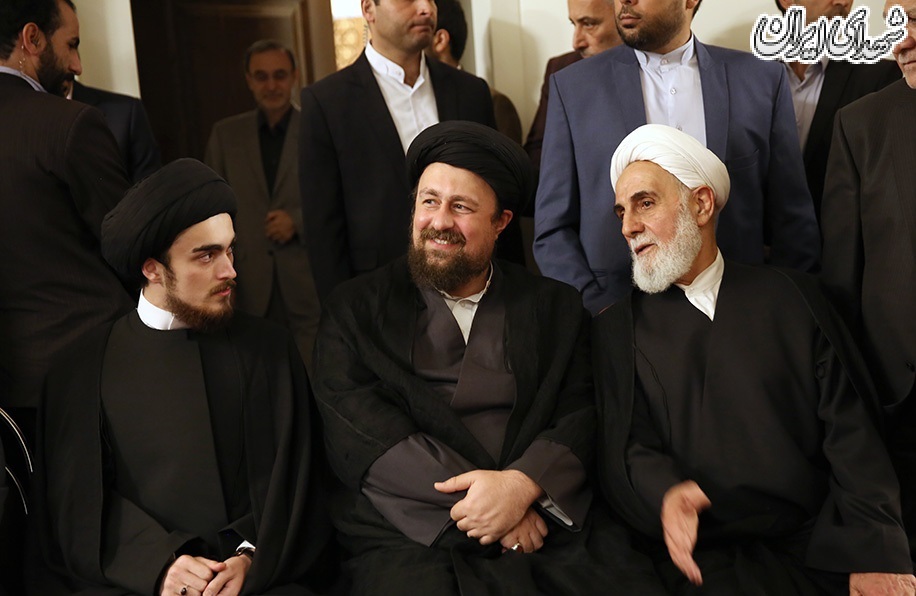 ناطق نوری، سید حسن و فرزندنش در یک مراسم