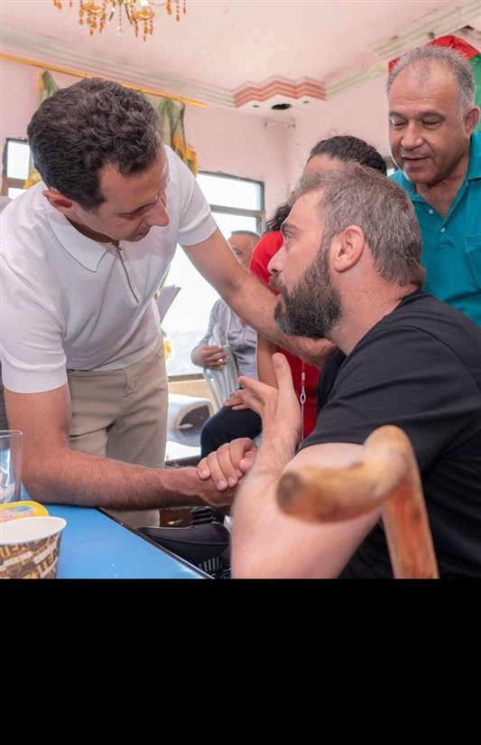 دیدار بشار اسد و همسرش با مجروحان و فرزندان شهدا دیدار بشار اسد و همسرش با مجروحان و فرزندان شهدا