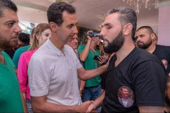 دیدار بشار اسد و همسرش با مجروحان و فرزندان شهدا دیدار بشار اسد و همسرش با مجروحان و فرزندان شهدا