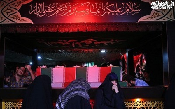 وداع با پیکر دو شهید مدافع حرم در معراج شهدا وداع با پیکر دو شهید مدافع حرم در معراج شهدا