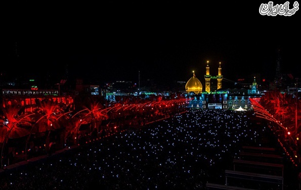 تعویض پرچم حرم امام حسین (ع) در کربلا