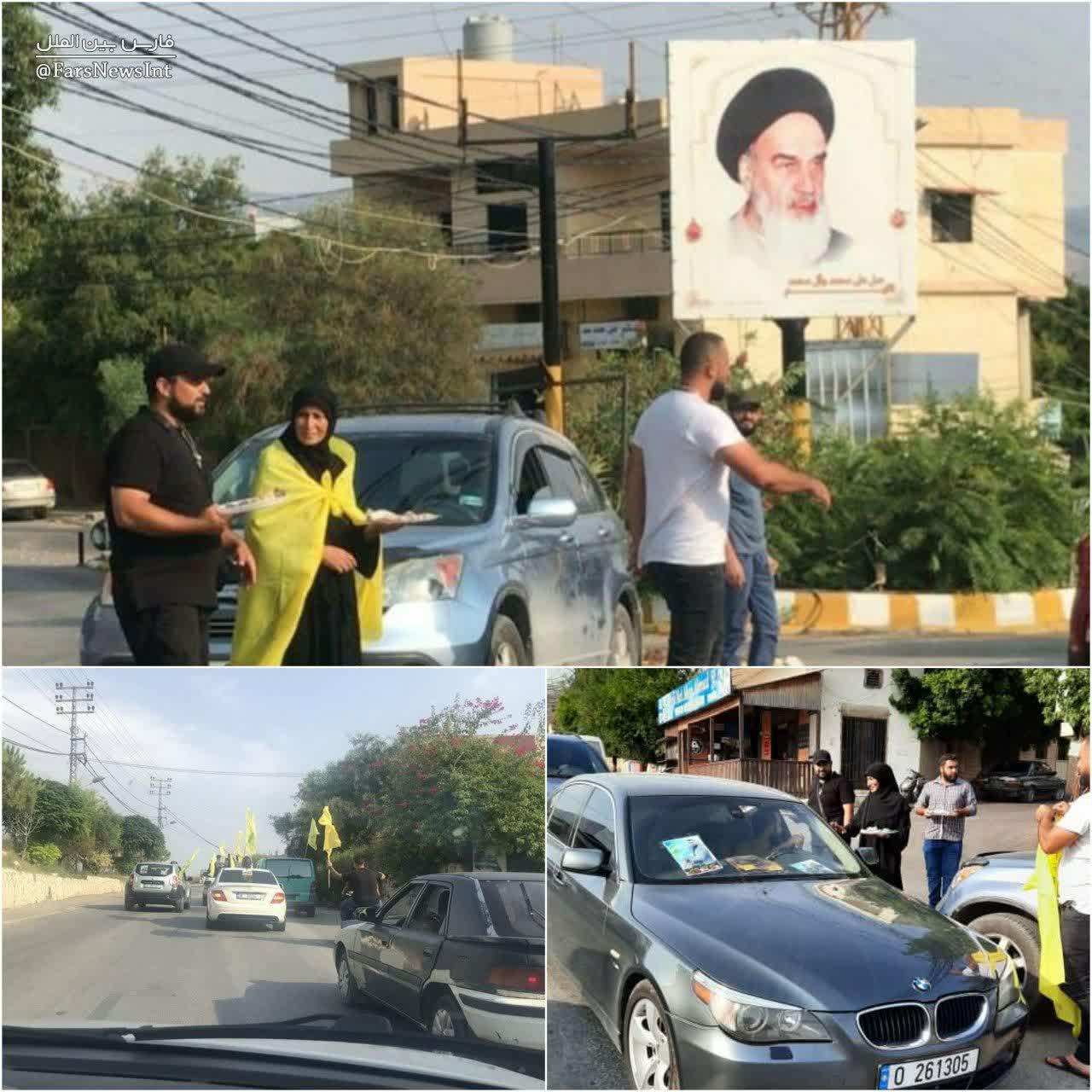 مادر شهید لبنانی در حال پخش شیرینی مادر شهید لبنانی در حال پخش شیرینی