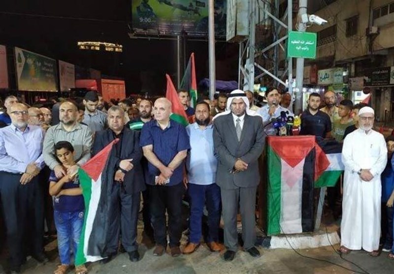 تظاهرات فلسطینیان در حمایت از موضع حماس تظاهرات فلسطینیان در حمایت از موضع حماس